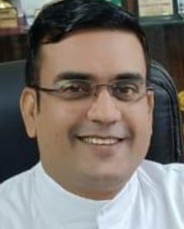 Father Manish